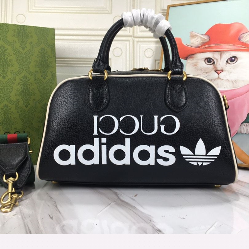 G*u*i top handle bags